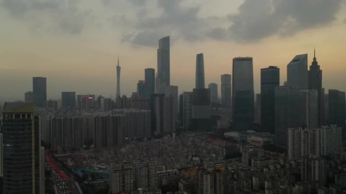 日落时间天空广州市市中心旧生活街区交通空中全景4k中国