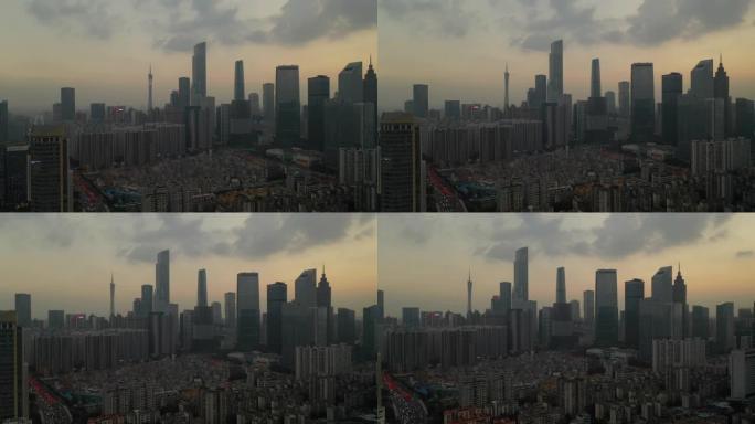 日落时间天空广州市市中心旧生活街区交通空中全景4k中国