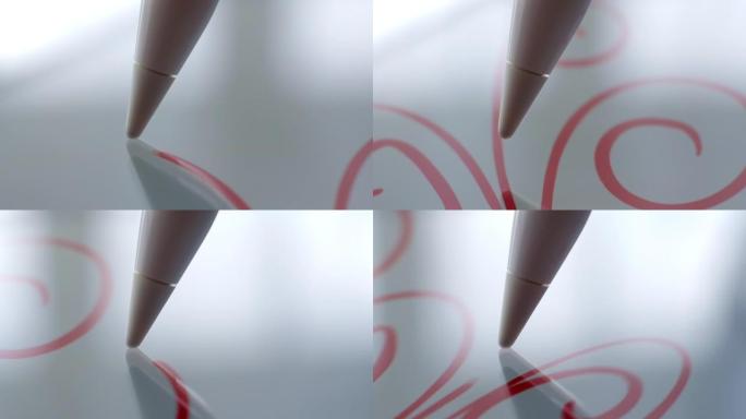宏观跟随艺术家用铅笔在数字平板电脑上绘画的镜头。铅笔连接到相机。抓拍。