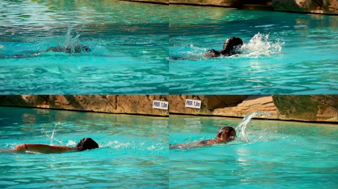 黑发小女孩正在游泳池里潜水游泳