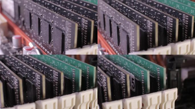 安装在主板上的DDR3 RAM内存模块的宏视图，滑块拍摄