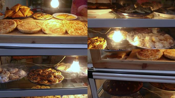 Fez Medina市场柜台上的各种东方面包蛋糕