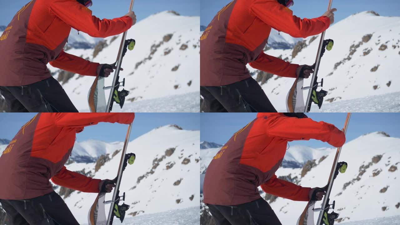 滑雪者将皮毛粘在滑雪板的底部