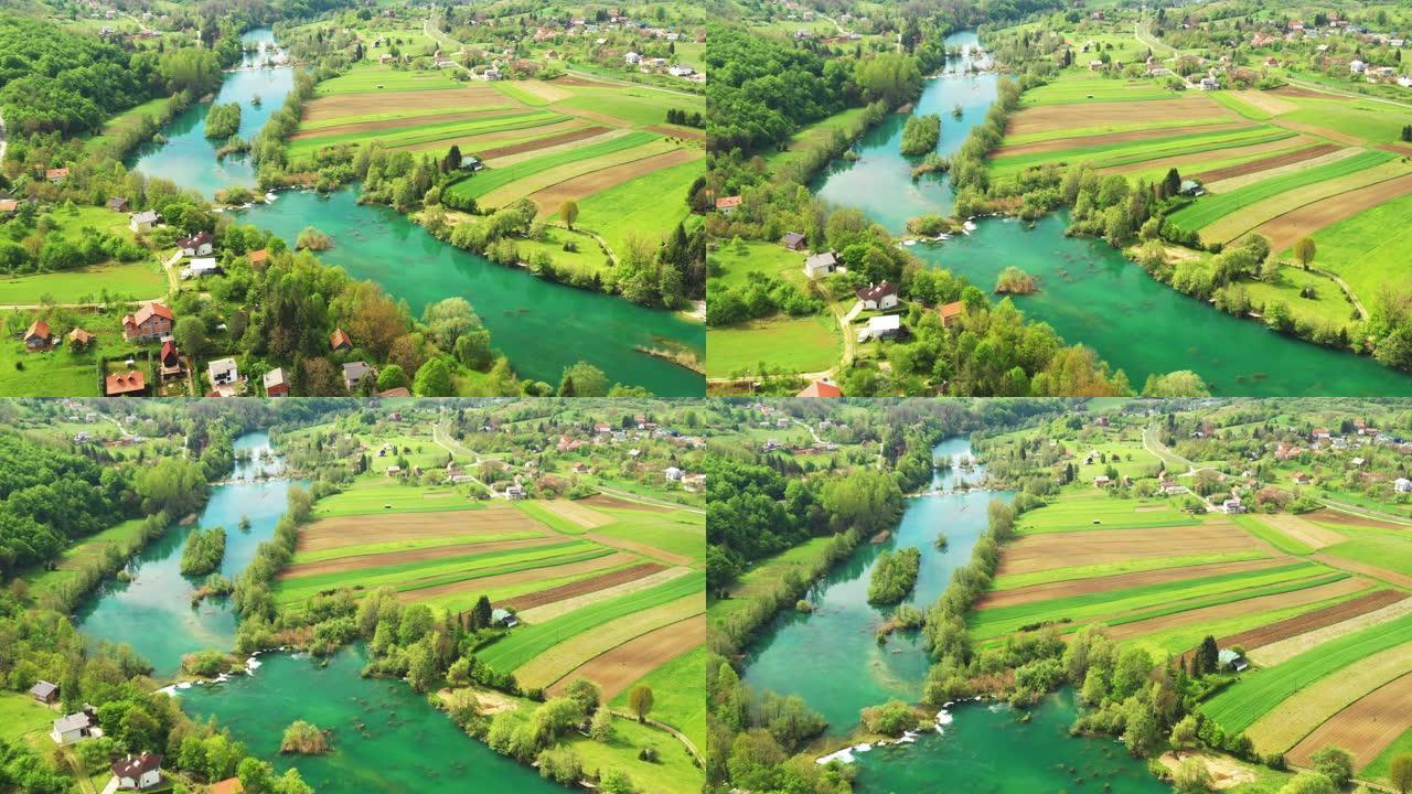 克罗地亚乡村景观，从空中俯瞰美丽的绿色的Mreznica河，贝拉维奇村全景