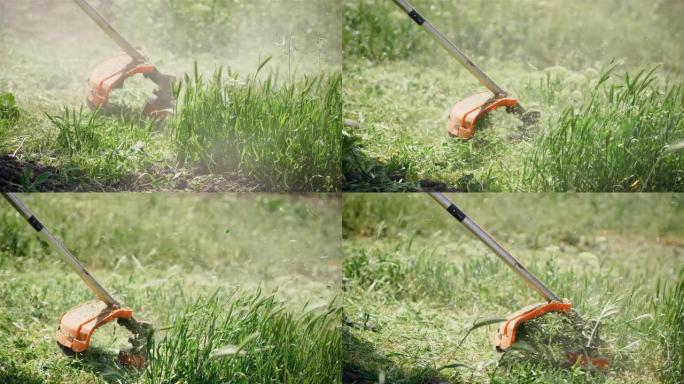 园丁割草时关闭电动割灌机工具