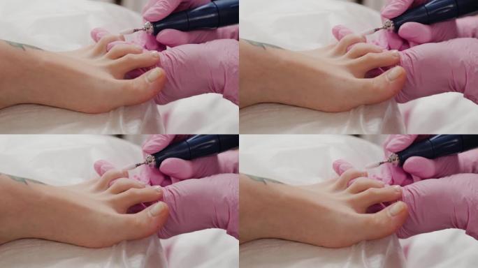 修脚大师锯女人的脚趾甲