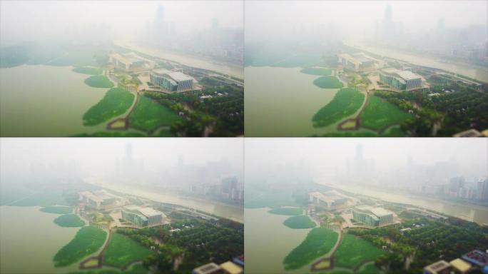 雾天武汉城市景观湖空中全景4k倾斜移位中国