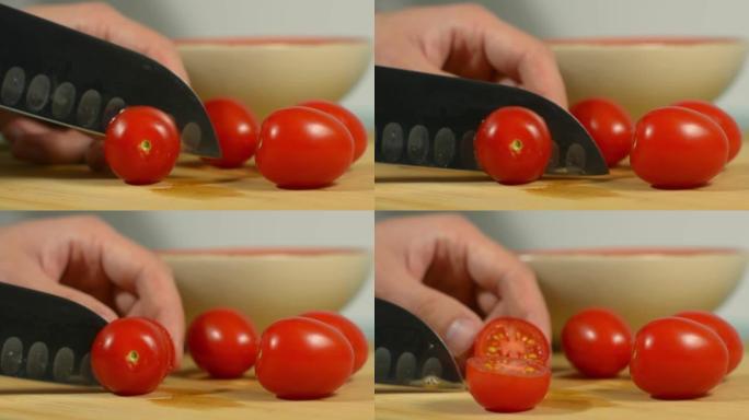 将新鲜的樱桃番茄切成薄片放在厨房的桌子上