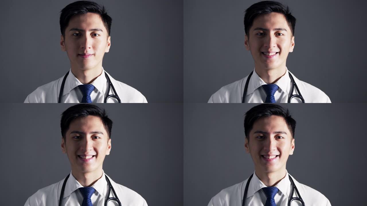 微笑自信的亚洲医生的肖像