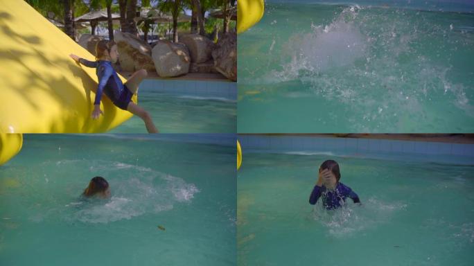 在水上公园的充气障碍赛道上的小男孩。夏季概念。慢动作镜头