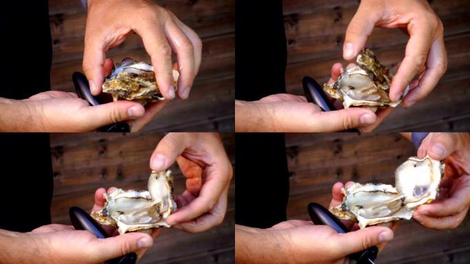 男人们用一把特制的刀打开新鲜美味的牡蛎
