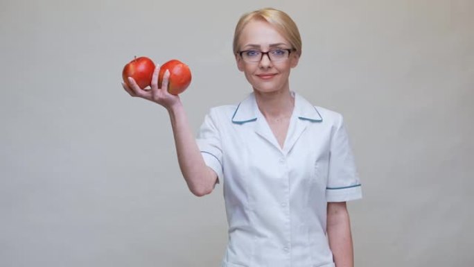 营养师医生健康生活理念 -- 手持有机红苹果