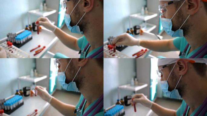 冠状病毒用血液样本测试试管的科学家简介。年轻的实验室工作人员戴着防护眼镜检查血液样本以新型冠状病毒肺