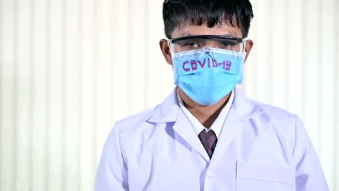 正面医生流行病学家的肖像，带有文字和徽标的位置。与冠状病毒大流行作斗争的病毒学家显示出okey标志，