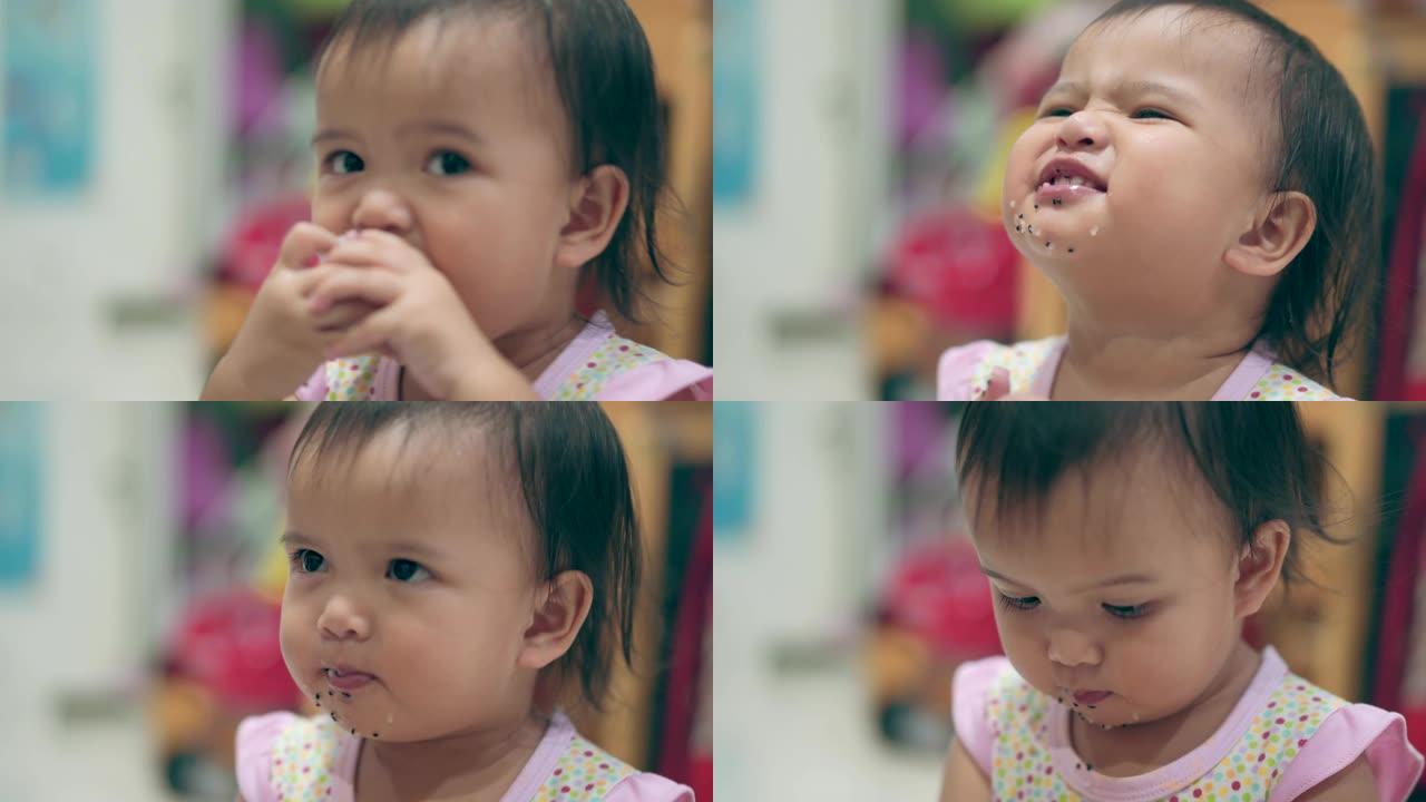 亚洲女婴吃火龙果特写