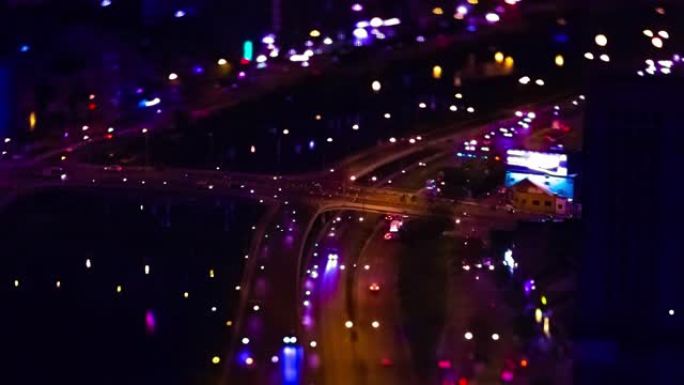 越南胡志明市小型交通拥堵的夜间延时高角度倾斜