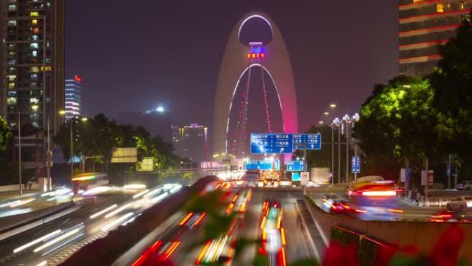 著名的瓜州市市区繁忙的交通路桥夜间照明延时全景4k中国