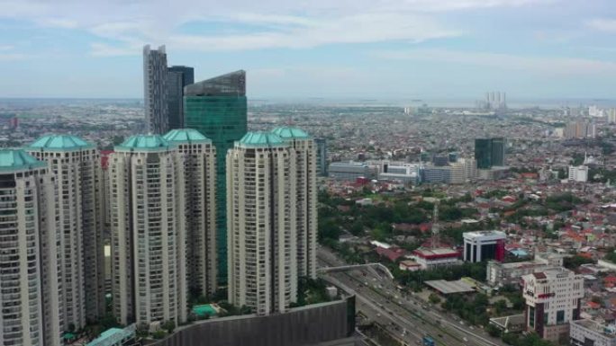 雅加达城市景观晴天中央公寓公寓综合空中全景4k印度尼西亚