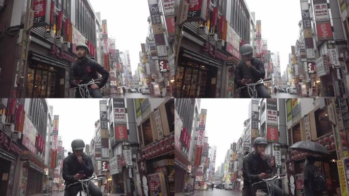 东京使用智能手机的日本自行车信使