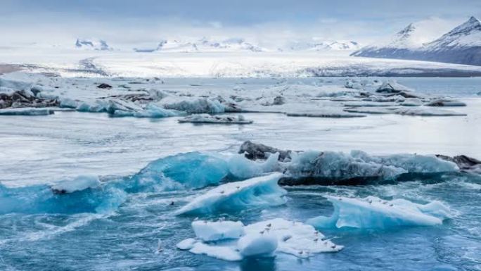 冰岛，Jokulsarlon泻湖，美丽的寒冷景观4k冰岛冰川泻湖湾的延时。4K Timelaspe