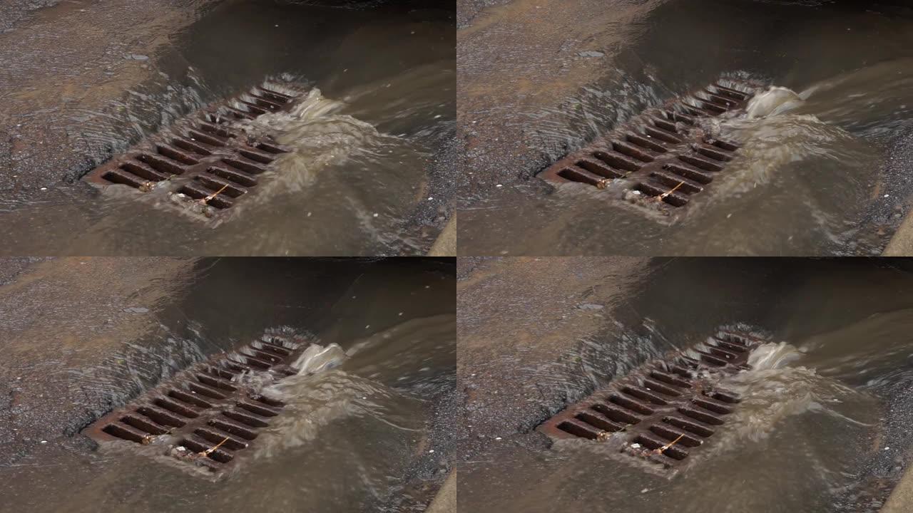 雨水通过铁网排入下水道