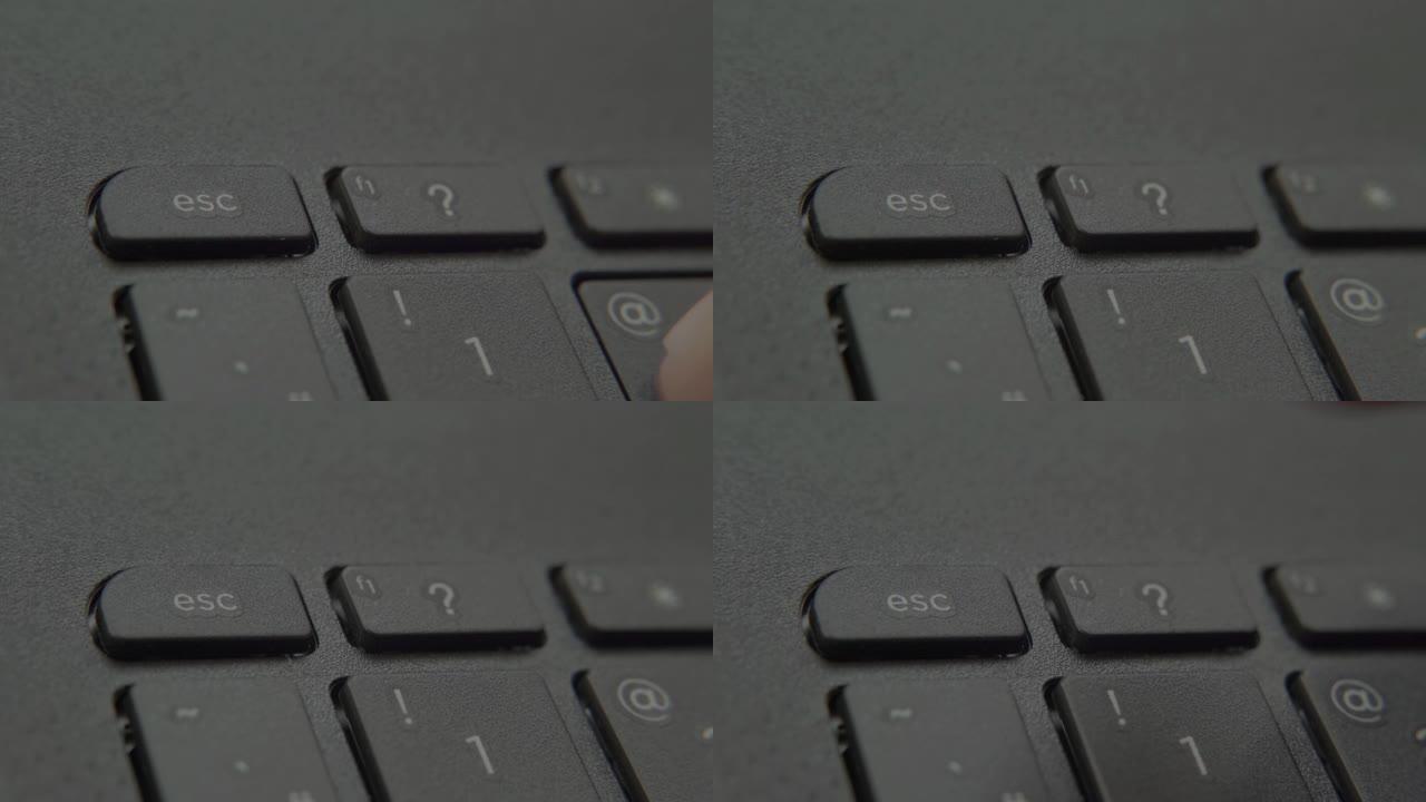 手指按下键盘上的逃生按钮