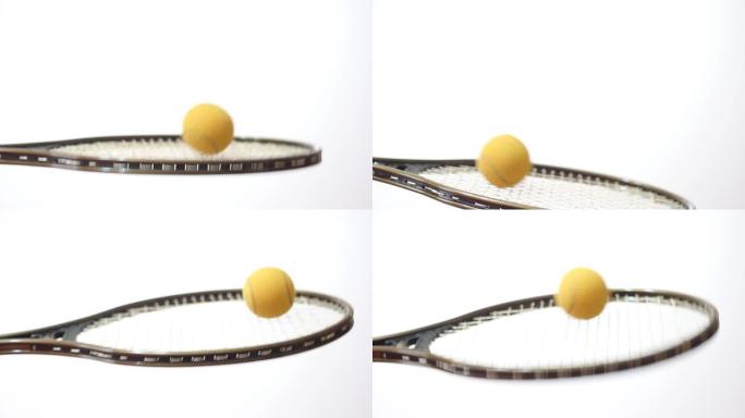 网球拍和球隔离在白色背景