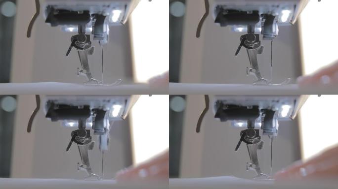自动缝纫机的女裁缝和针的工作特写慢动作视频，良好的修指甲