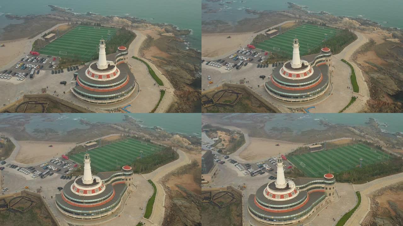 白天烟雾青岛市灯塔水族馆运动地面海湾空中全景4k中国