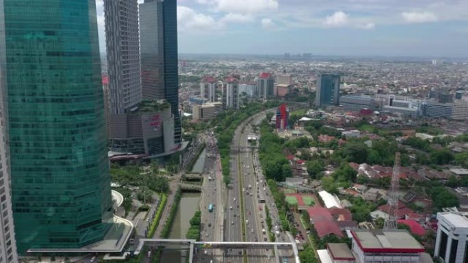 雅加达市晴天市中心交通街道路空中俯拍全景4k印度尼西亚