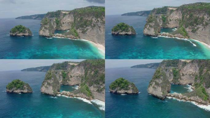 印度尼西亚努沙佩尼达钻石海滩的海洋和山脉鸟瞰图