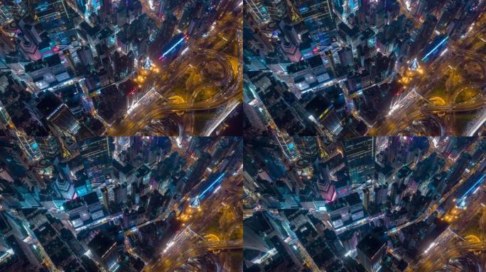 夜间照明飞行在香港市区交通拥堵空中全景4k延时