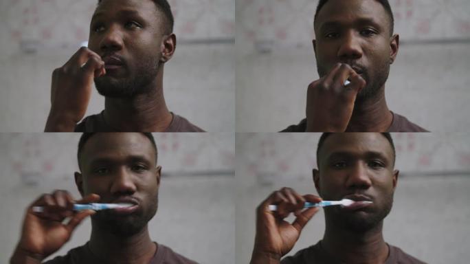年轻黑人在家刷牙