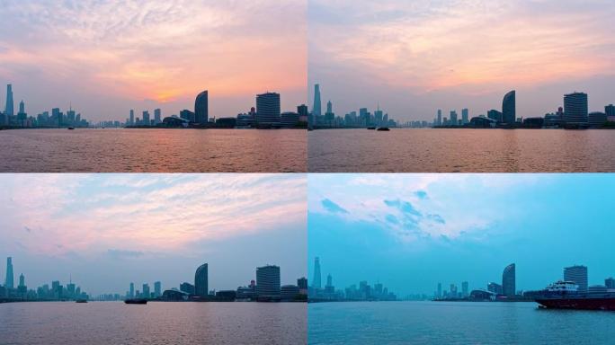 上海城市日落的延时镜头，外滩天际线和黄浦江背景，货船在河上航行，从日落到蓝色小时，4k视频，b滚动镜