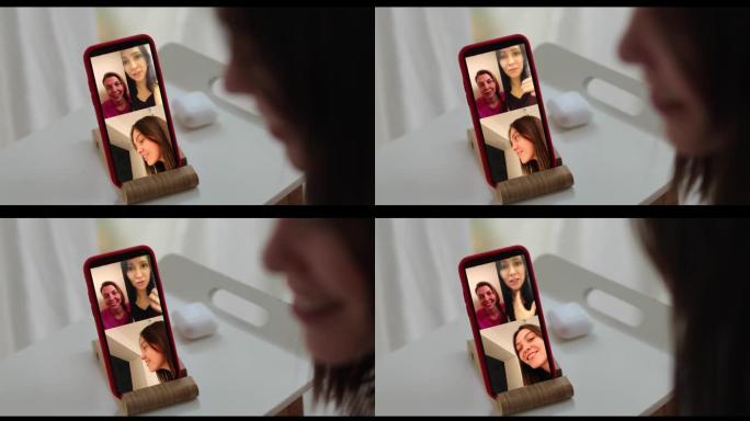女人在智能手机上进行视频通话。