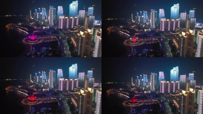 夜间照明秀青岛市著名市中心纪念碑交通湾空中全景4k中国