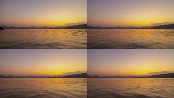 日落天空杭州城著名的湖船骑行海湾全景延时4k中国