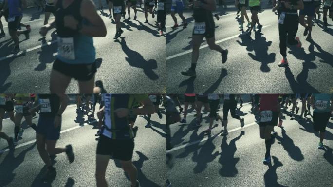 马拉松运动员在沥青上的阴影