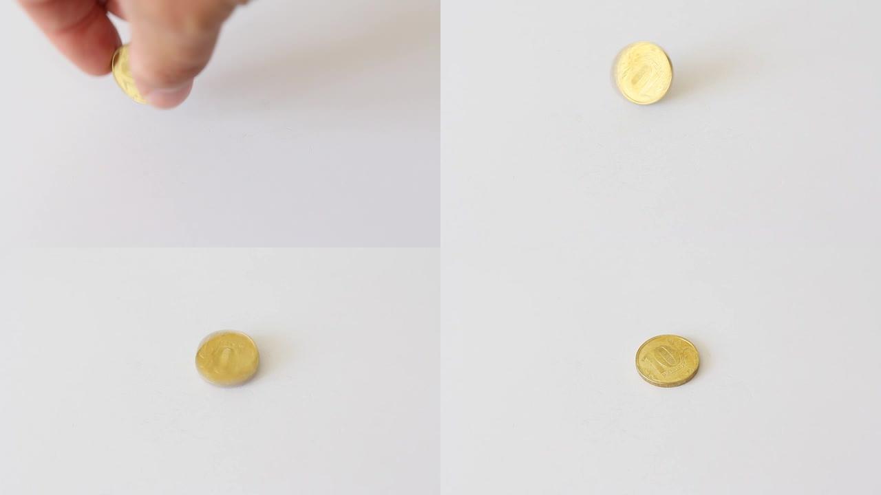 金色落下的硬币孤立在白色背景上