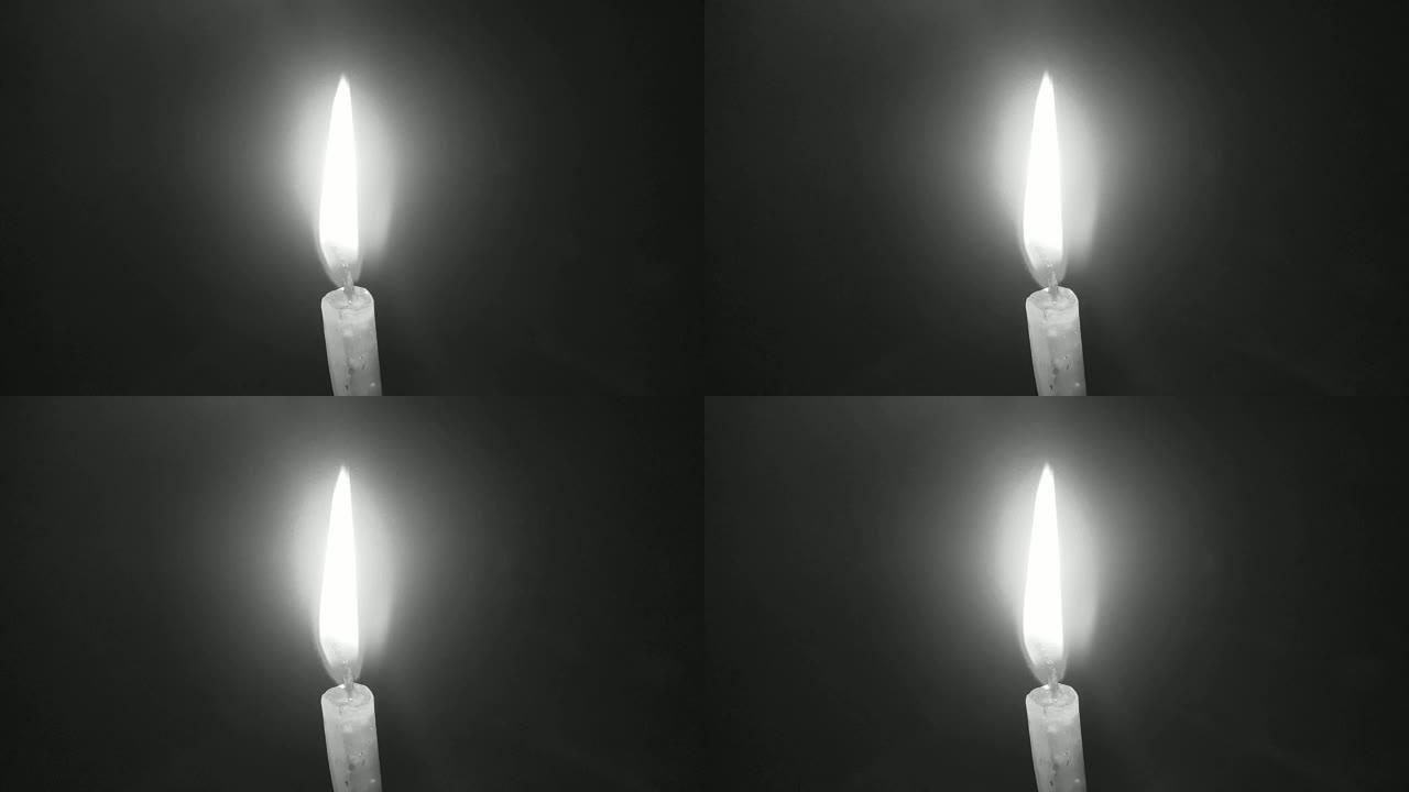 黑色背景蜡烛。黑白
