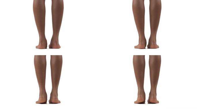 非洲妇女的背影站在脚跟和踮起脚尖。美丽的女性身体概念。孤立，在白色背景上