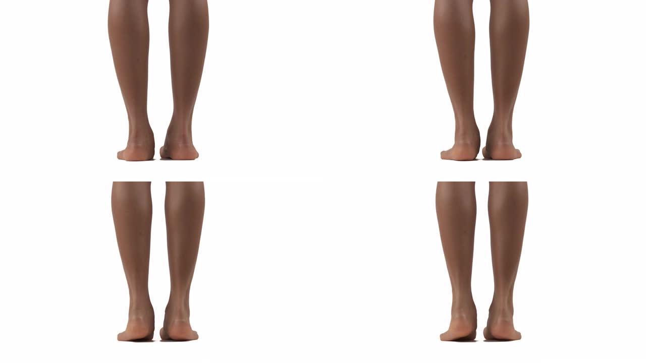 非洲妇女的背影站在脚跟和踮起脚尖。美丽的女性身体概念。孤立，在白色背景上
