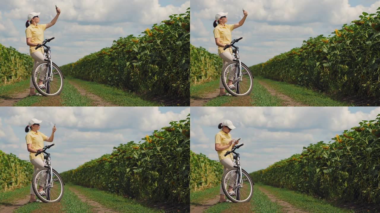 女子骑自行车的人在自然界中捕捉到电话信号