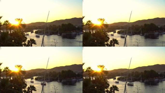 日落时分，阿斯旺尼罗河河岸的长镜头美丽的历史风景