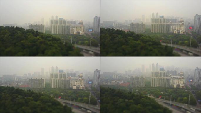 白天烟雾武汉城市空中公园全景4k倾斜移位中国