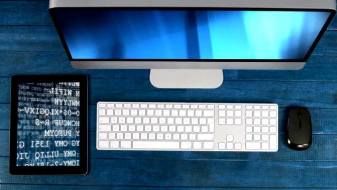 数字平板电脑和电脑显示器的动画，在屏幕上显示蓝色动画。