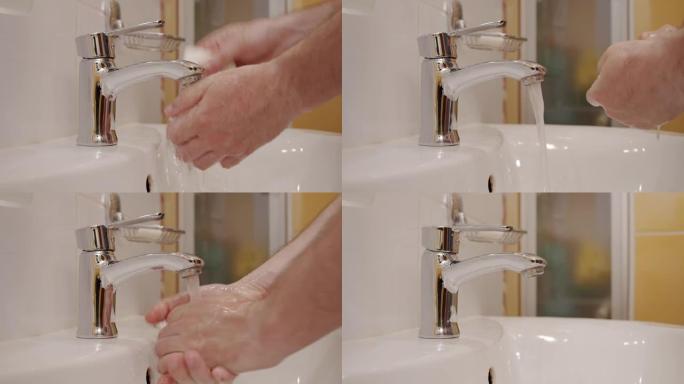 电晕病毒预防男子展示手卫生用热水肥皂洗手。使用肥皂。