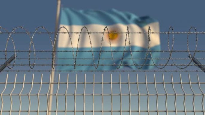 反对挥舞着阿根廷国旗的铁丝网