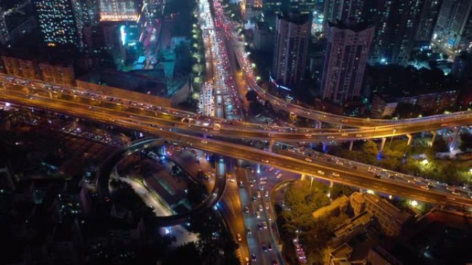 广州市中心夜间照明繁忙交通街路口空中全景4k中国