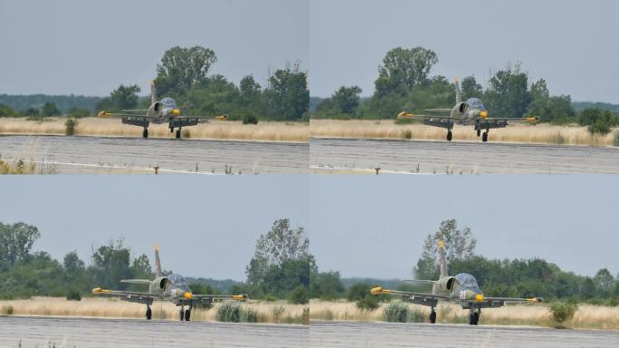 军用战斗机飞机L-39在慢动作着陆后近距离观察